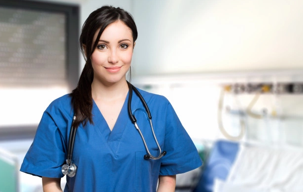 smiling-female-medical-student-scrubs